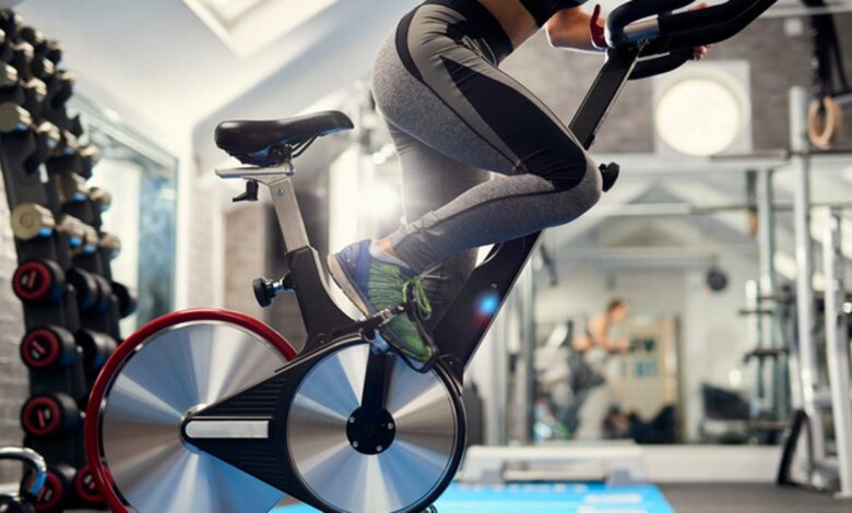 9 Ways You’re Using Your Exercise Bike Wrong, According to Cycling Pros